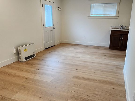 living room from back corner toward ground level entrance