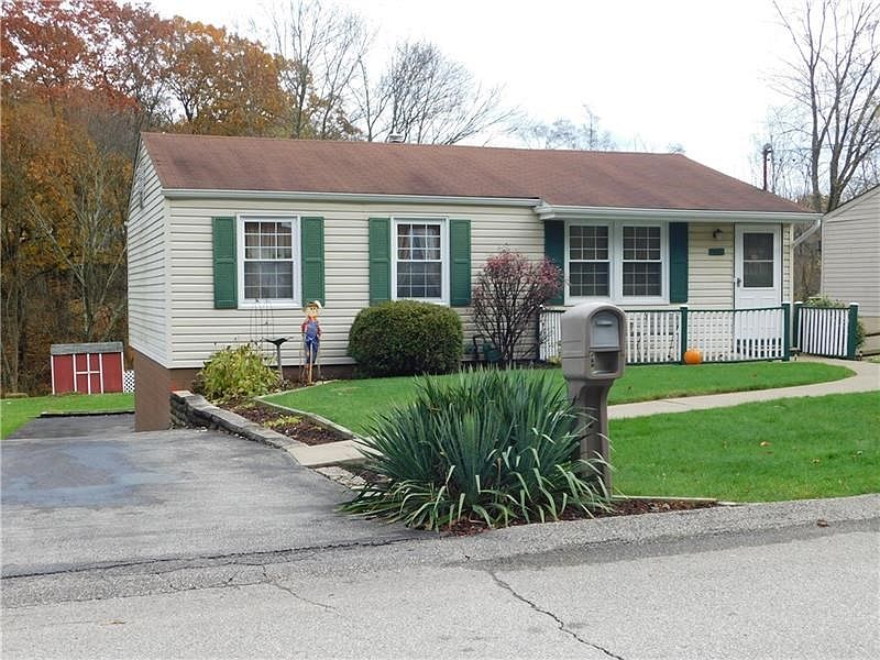 Entry level 3 bedroom ranch with finished basement and deck on .3 acre lot