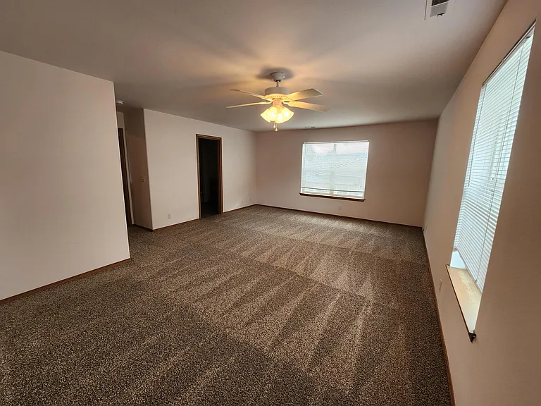 Another look at main bedroom with private bath & closet