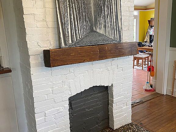 Hand hewn solid wood mantle