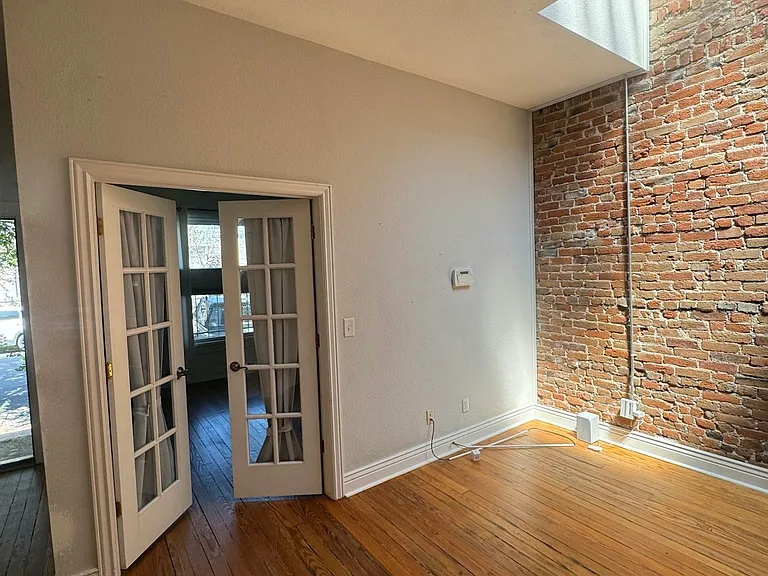 Living Room looking at Bedroom entry