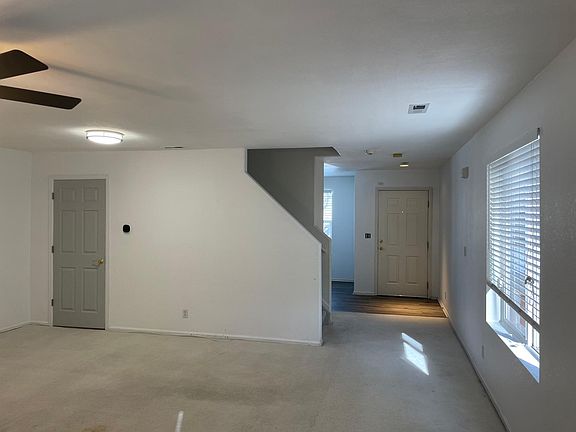 Second view from rear door of large living room.