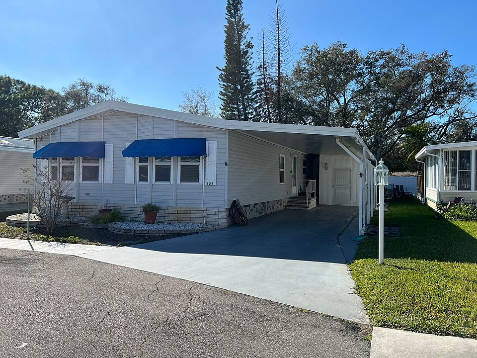 Exterior showing covered parking area