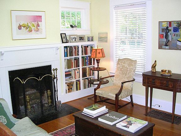 Living Room has original, working fireplace, built in bookcases 