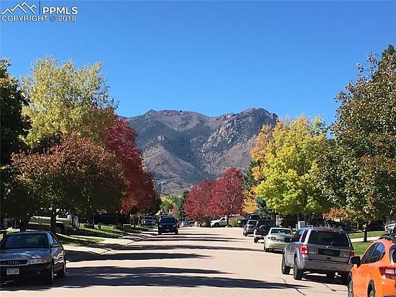 See this view every time you drive to your house.  Trees and mountains!  Colorado at its best!