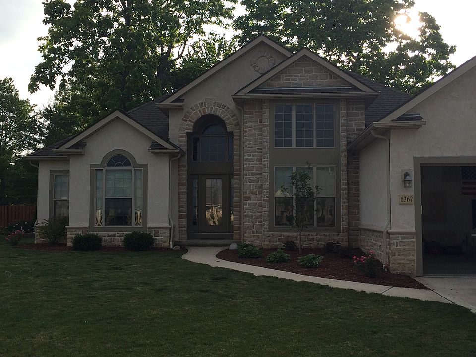 Newly seeded lawn and landscaping