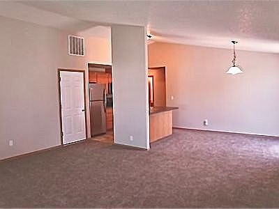 Open floor plan with vaulted