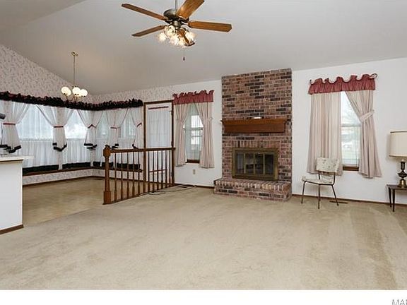 Shot from the large entry foyer, looking at breakfast room on the far side