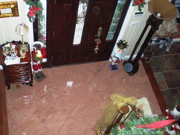 Entrance with Marble flooring and Custom Door