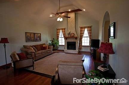 Living Room
						:
						Vaulted Ceilings, hardwood floors and gas fireplace.