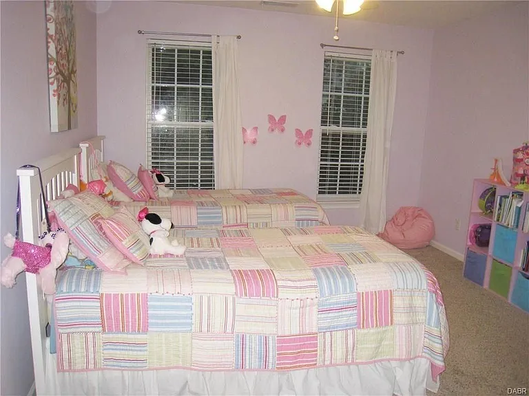 1 of the 3 approval bedrooms upstairs. Each bedroom has its own ceiling fan and closet space!