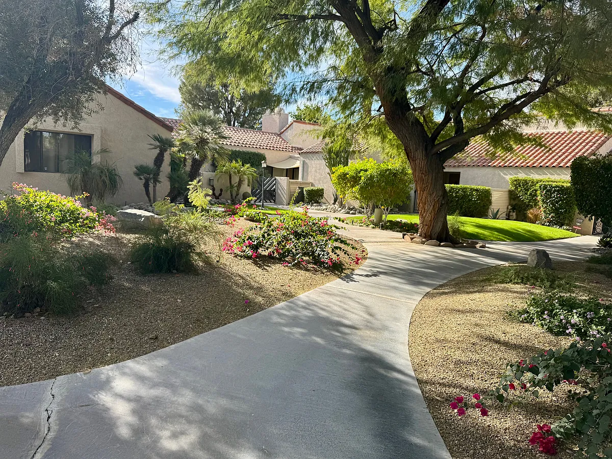 Walking toward home. - 310 Forest Hills Dr