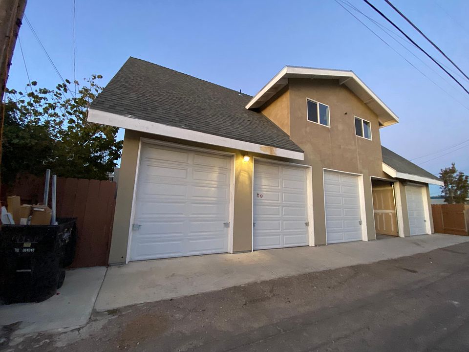 Upstairs Unit includes 2 car garage (tandem)