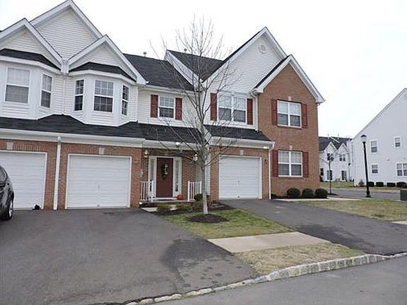 Front of home with view of driveway