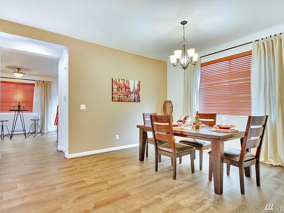 All new flooring on the lower level. Dining room flows into the kitchen/family room.