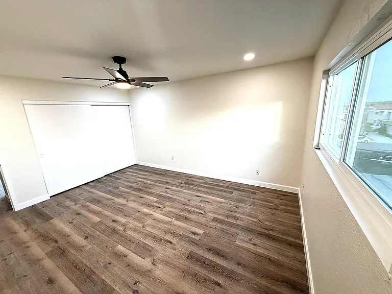 Bedroom 2 upstairs with 8 ft wardrobe closet.