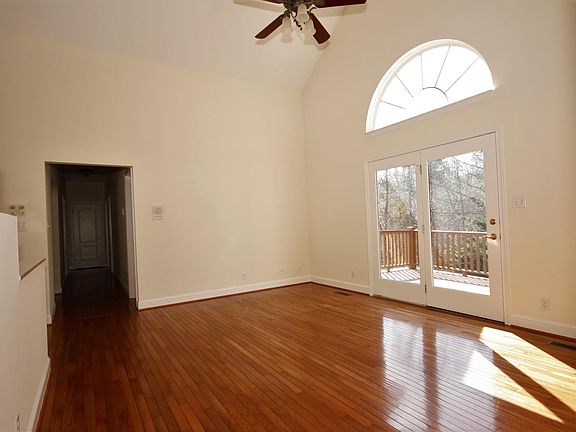 Living Room with High Ceiling and Lots of Light!