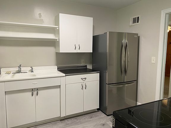 New refrigerator, stove and flooring