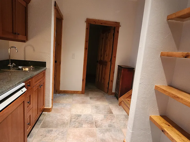 Downstairs landing with wet bar