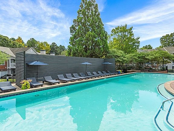 Resort-Style Pool and Lounge Chairs and Sundeck at Retreat at Peachtree Apartments