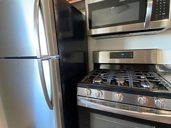 Pointing out the brand new (never used) appliances