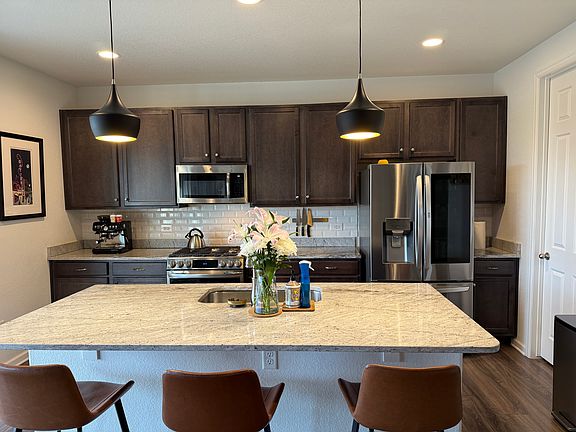 Kitchen with updated appliances and large center island