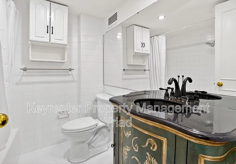 1101 N Elm St #104 — Photo 4