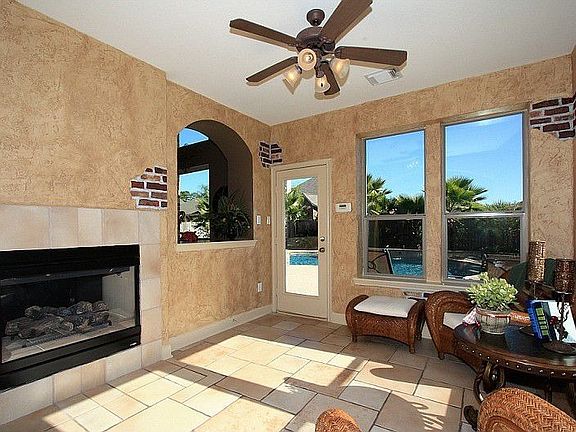 Sunroom off of Breakfast area. Opens out to Pool Area