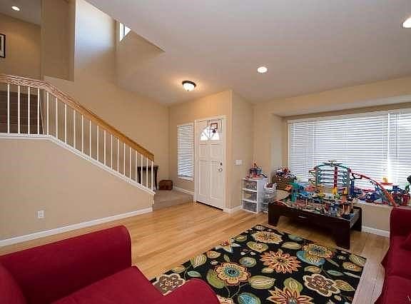 Formal living room offers window bench seating