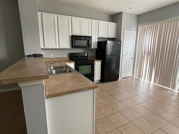 4th image of 7606 Long Island Dr #1