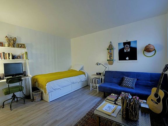 Bedroom #2 with trundle bed and futton