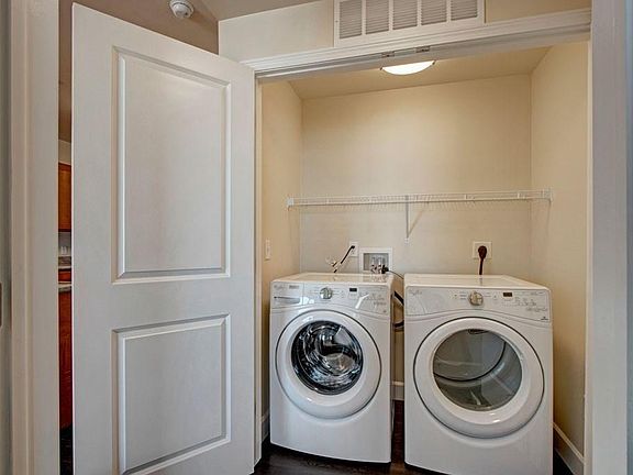 Large laundry closet with new washer & dryer (+more storage space).