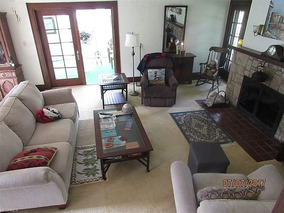 Living room with access to front porch.