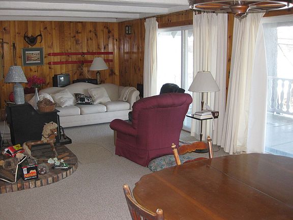 Large open living/dining room with beautiful water views.