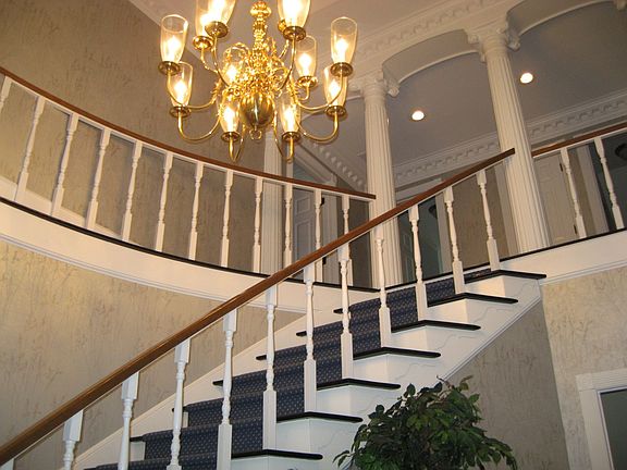 Grand curved Bridal staircase.