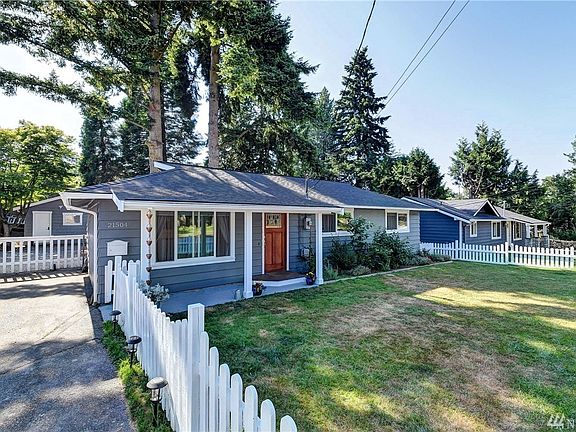 Fully fenced front and backyards.  Driveway parking w/room for RV and another vehicle.  