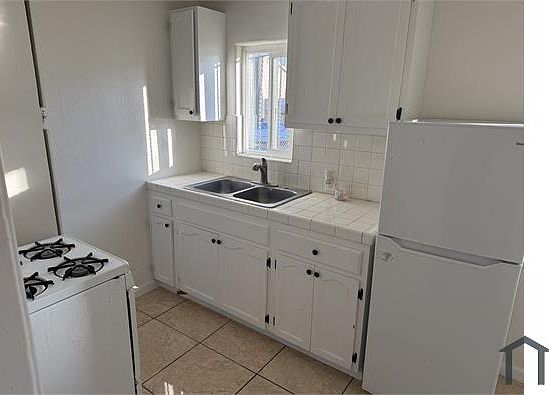 1st image of 10128 S Normandie Ave