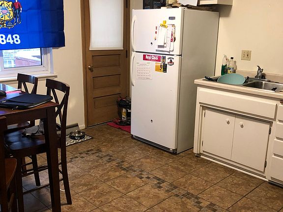 kitchen with door to small porch