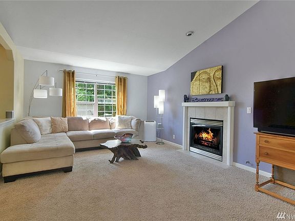 Living room with vaulted ceiling