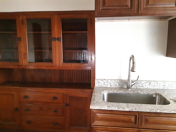 Kitchen with original built in cabinet