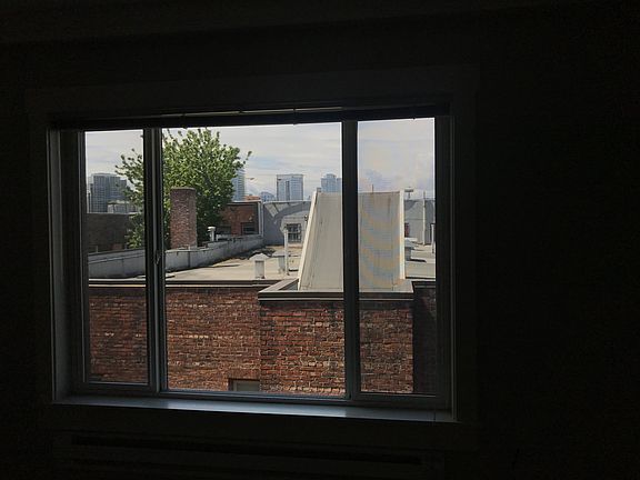 View of Downtown Seattle from living and dining area