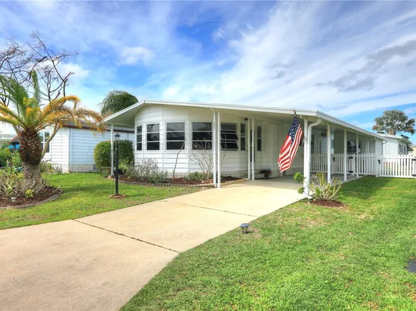 902 Periwinkle Cir, Barefoot Bay, FL 32976