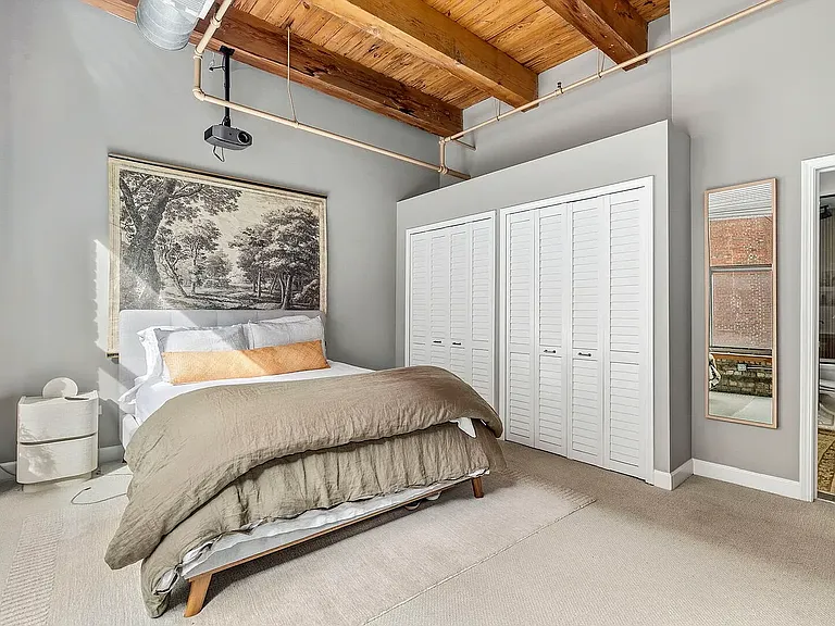 Primary bedroom with large closet and access to the bathroom