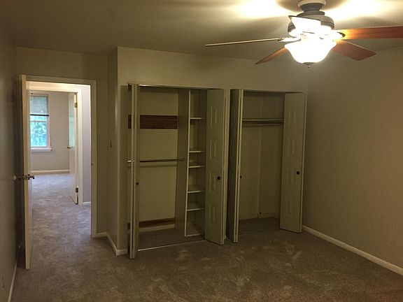 Large bedroom. 2 closets. Attached bathroom with stand-up shower. Ceiling light/fan. Easily accommodates king size bed.