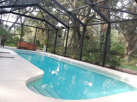 Enclosed pool and hot tub