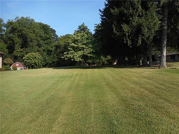 Yard: Imagine calling this home! 1.4 acres of serene tranquility for you to enjoy all that Mother Nature has to offer.