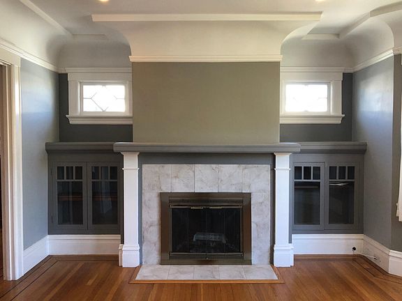 Wood Burning Fireplace & Built in Cabinets