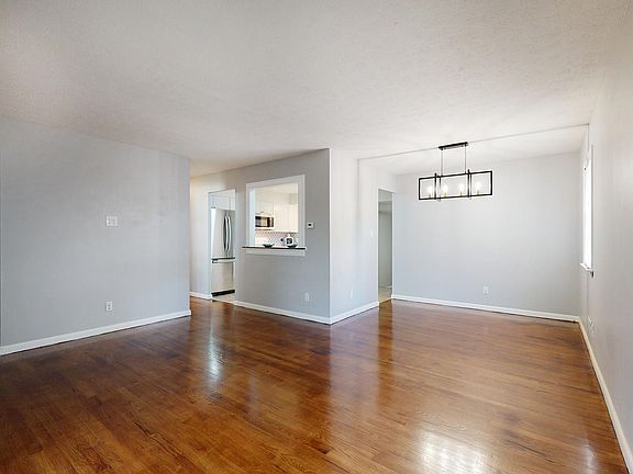 Refinished hardwood floors throughout.