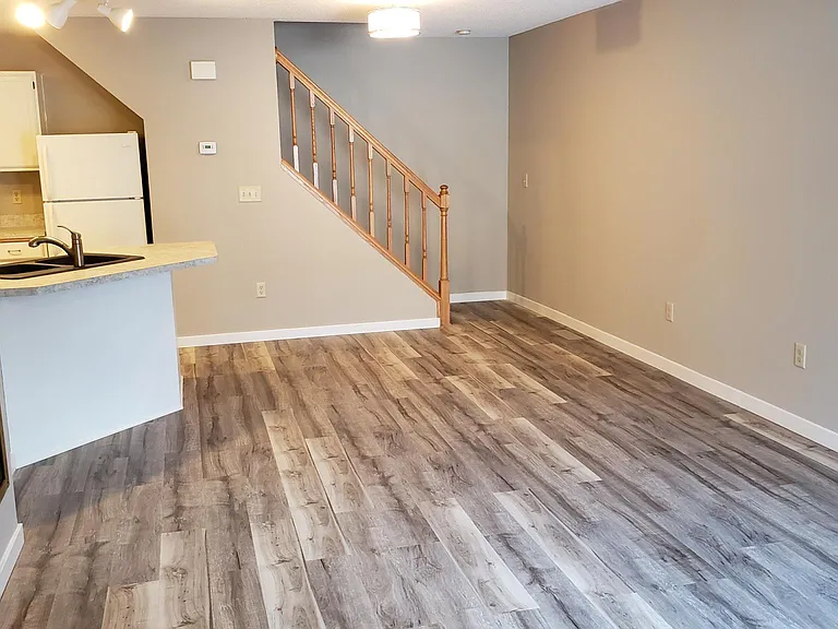 Living room showing room for dining table and stairs to Bedrooms and bathroom.