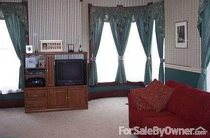 Living Room
						:
						Nine-foot ceilings, neutral carpet and lovely window-treatments.